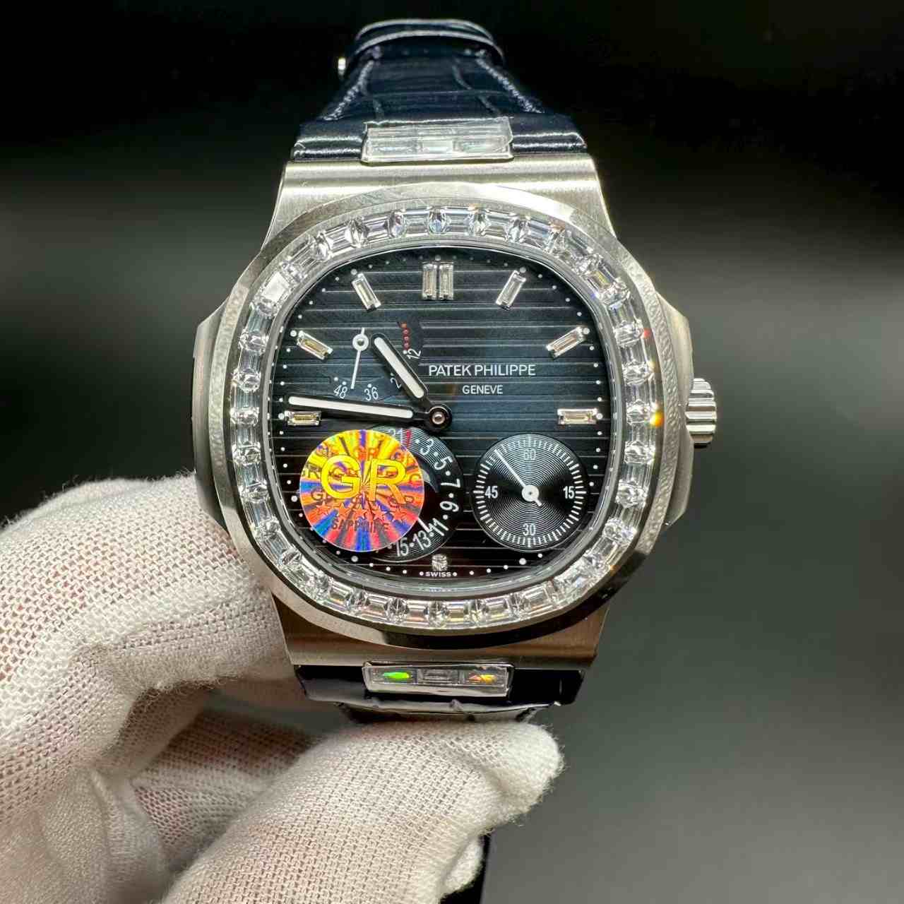 Patek Philippe Nautilus Moonphase 5712 GR factory Cal.240 automatic Stainless steel 40mm Baguette diamonds bezel Blue dial Black leather strap.  E85