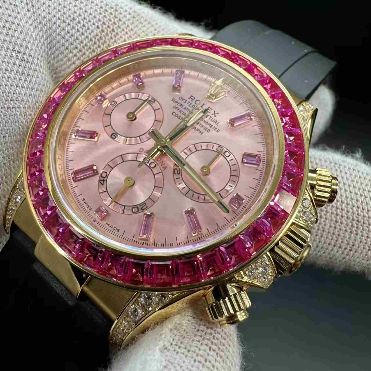 Daytona 4130 gold case pink dial red baguette diamonds bezel oysterflex black rubber strap. 1000$