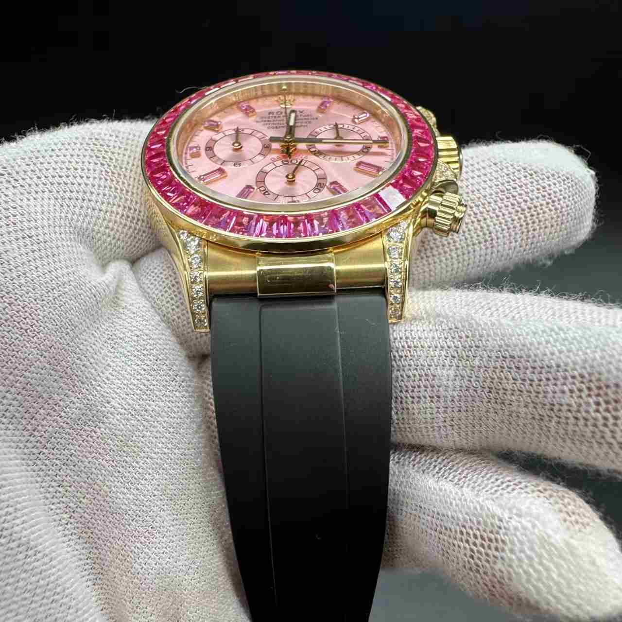 Daytona 4130 gold case pink dial red baguette diamonds bezel oysterflex black rubber strap. 1000$