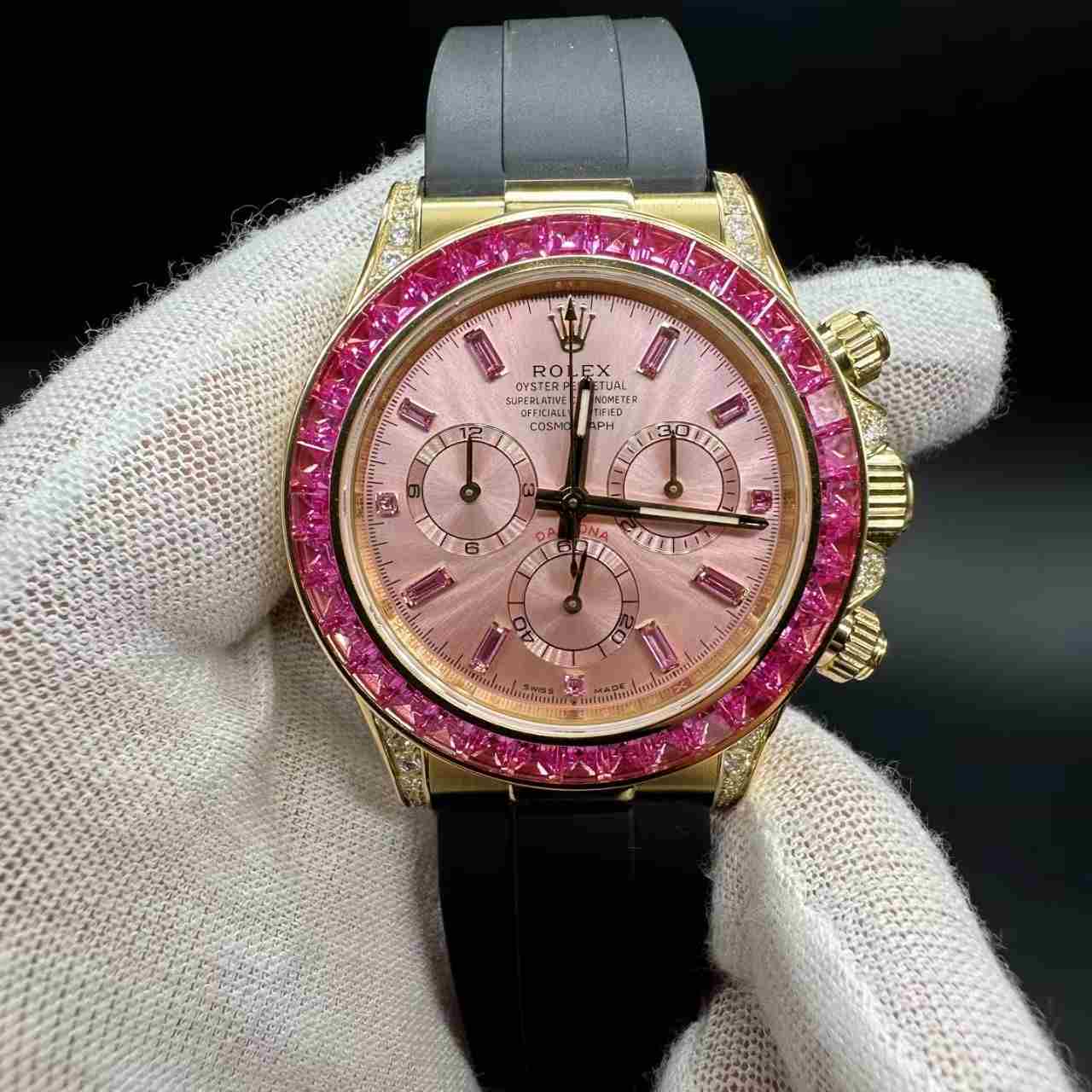 Daytona 4130 gold case pink dial red baguette diamonds bezel oysterflex black rubber strap. 1000$