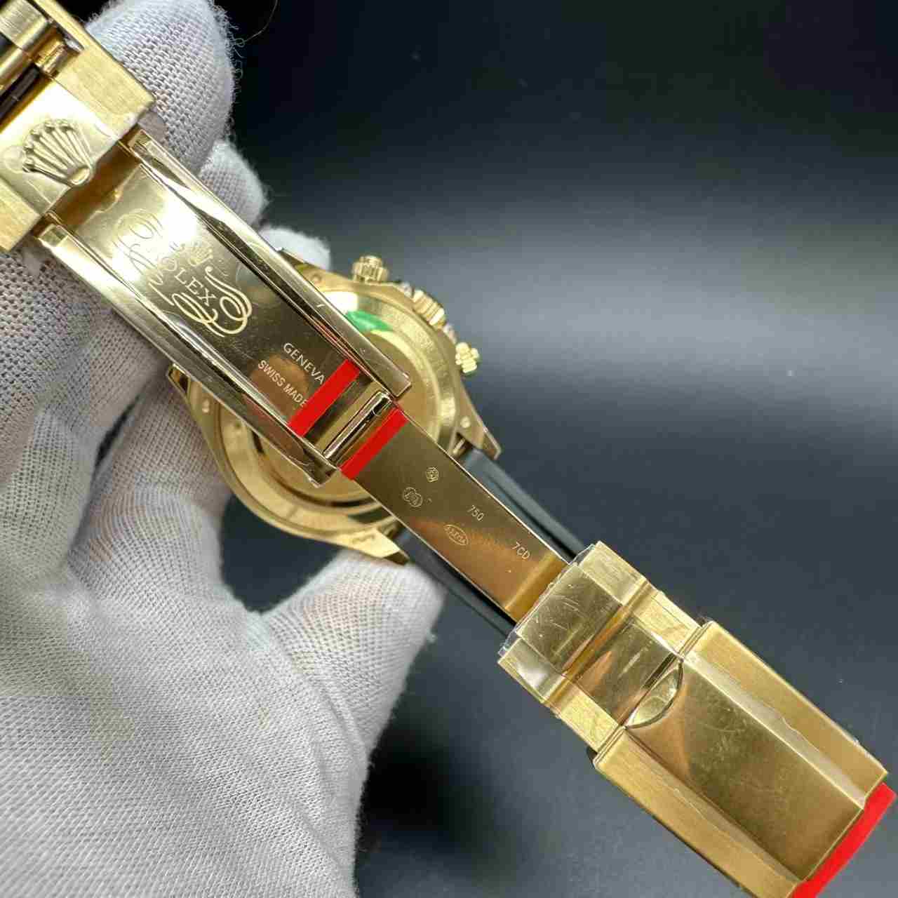 Daytona 4130 gold case pink dial red baguette diamonds bezel oysterflex black rubber strap. 1000$