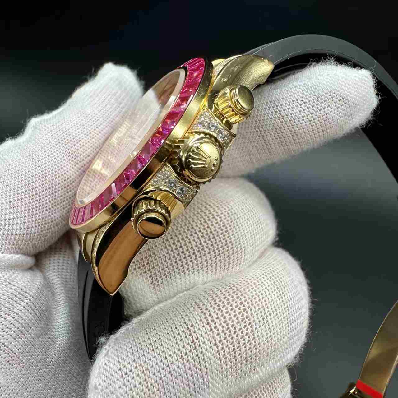 Daytona 4130 gold case pink dial red baguette diamonds bezel oysterflex black rubber strap. 1000$