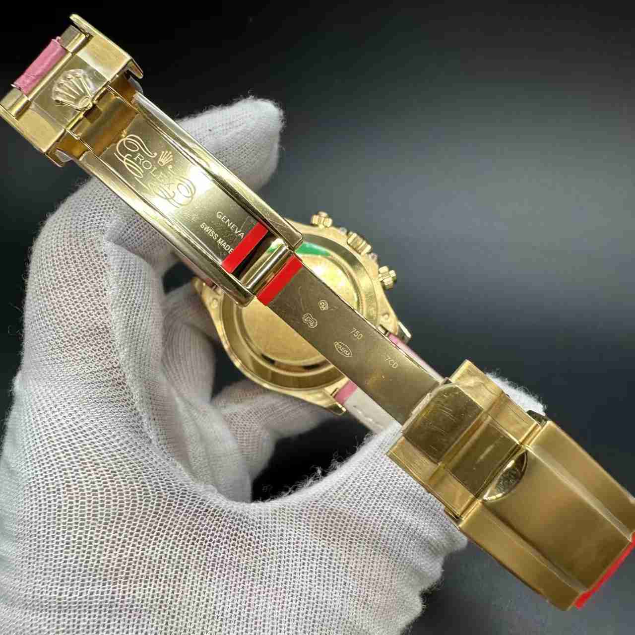 Daytona 4130 customized super clone Gold case baguette red diamonds bezel pink dial pink leather strap.  1000$