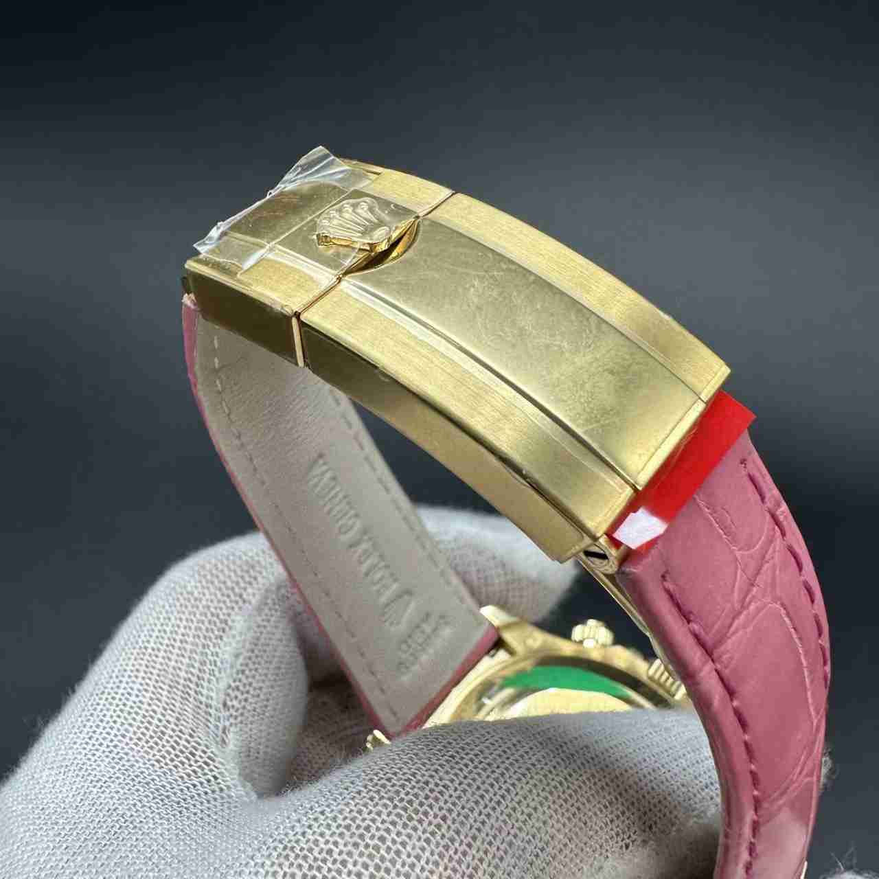 Daytona 4130 customized super clone Gold case baguette red diamonds bezel pink dial pink leather strap.  1000$