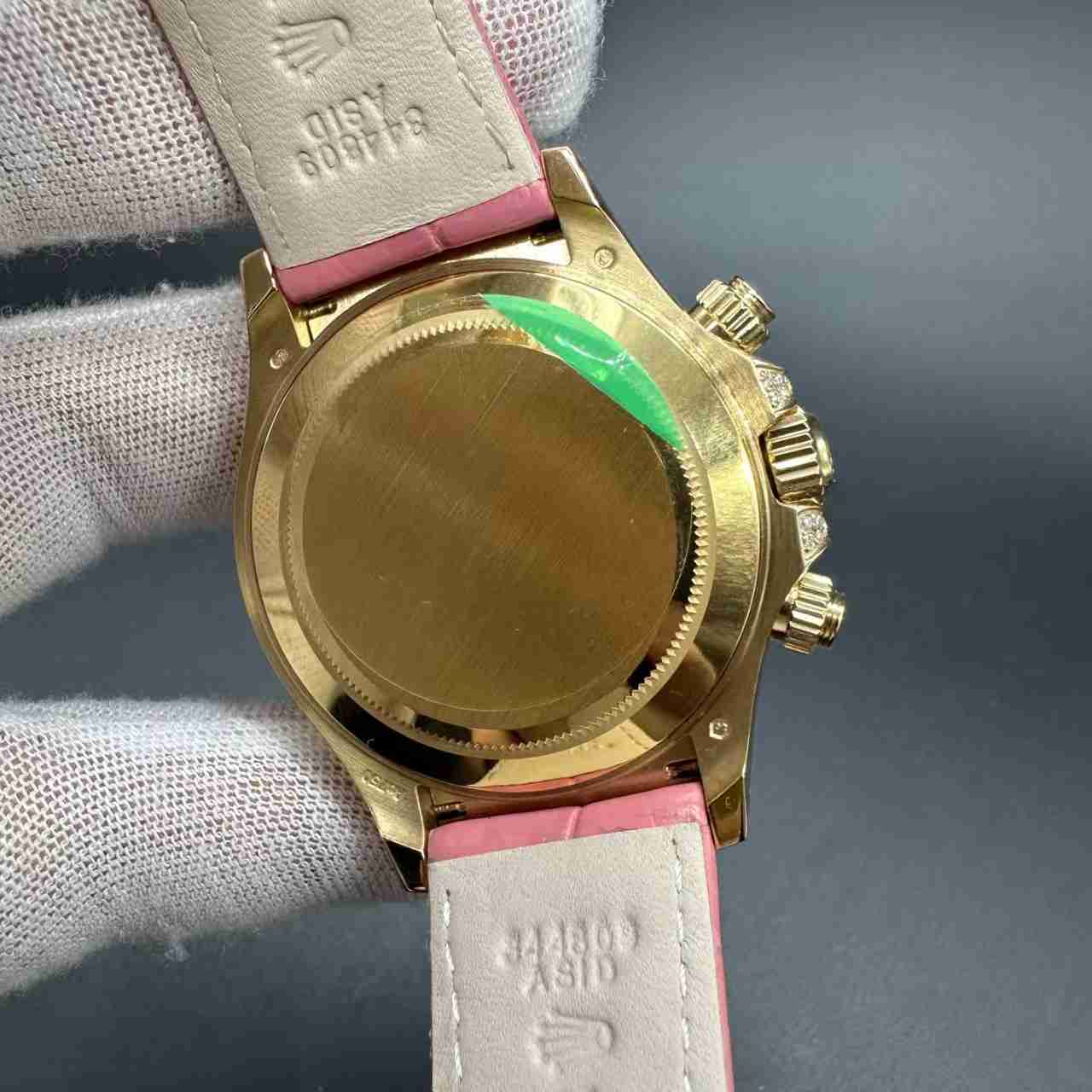 Daytona 4130 customized super clone Gold case baguette red diamonds bezel pink dial pink leather strap.  1000$