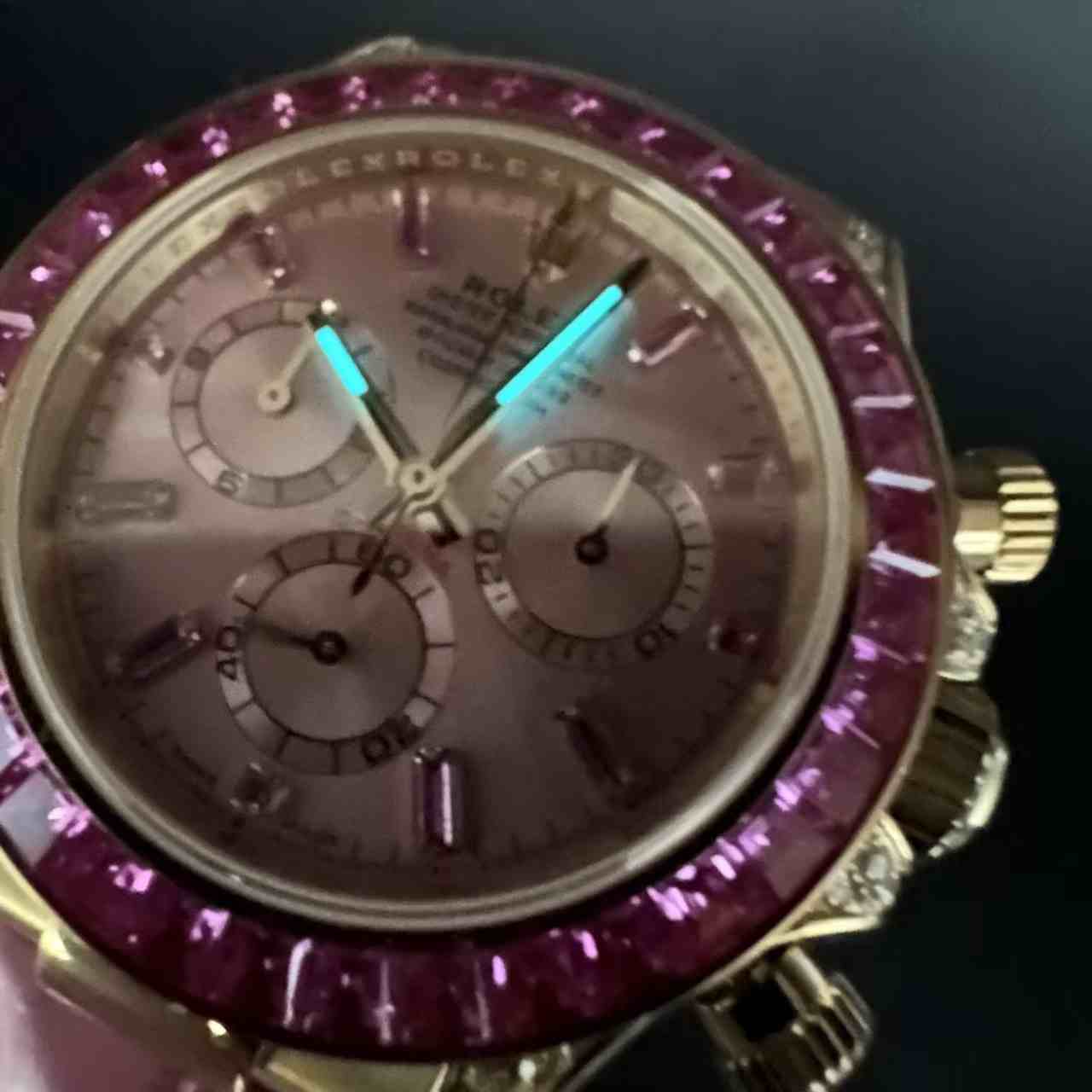Daytona 4130 customized super clone Gold case baguette red diamonds bezel pink dial pink leather strap.  1000$
