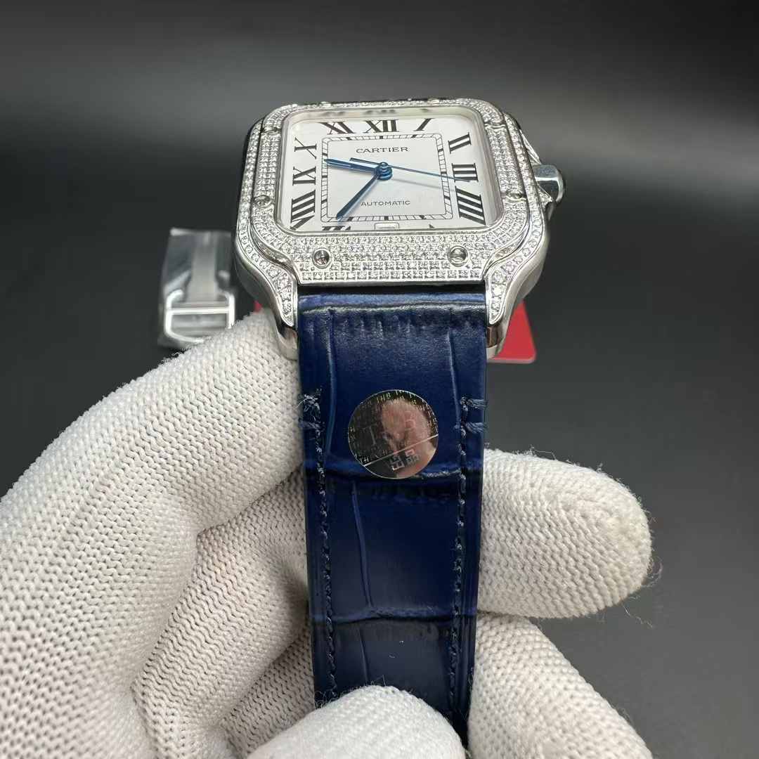 Cartier Santos THB 9015 automatic Diamonds silver case 38.5mn White dial Blue leather strap. 320$