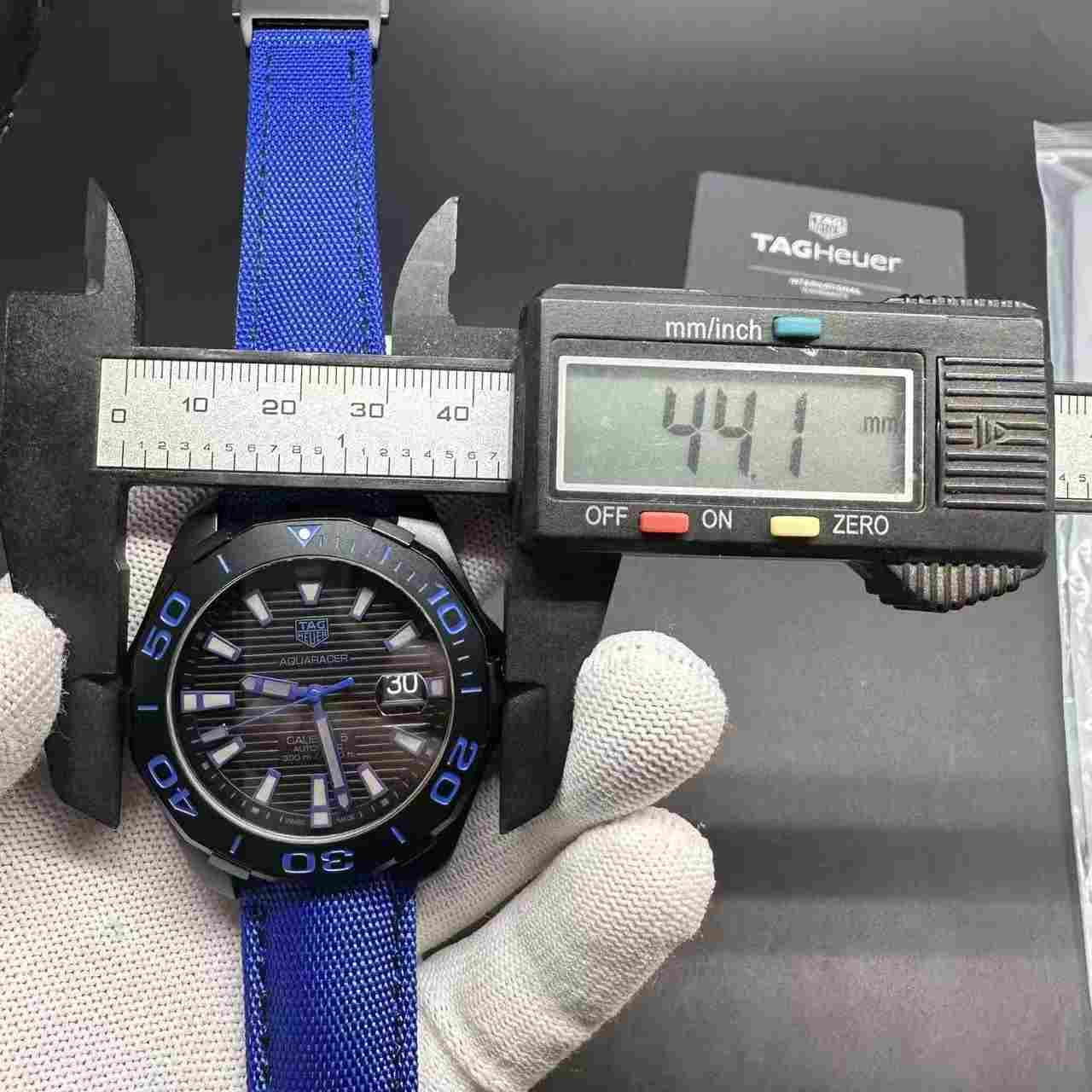 TAG Aquaracer Swiss automatic black case 44mm blue strap. 350$