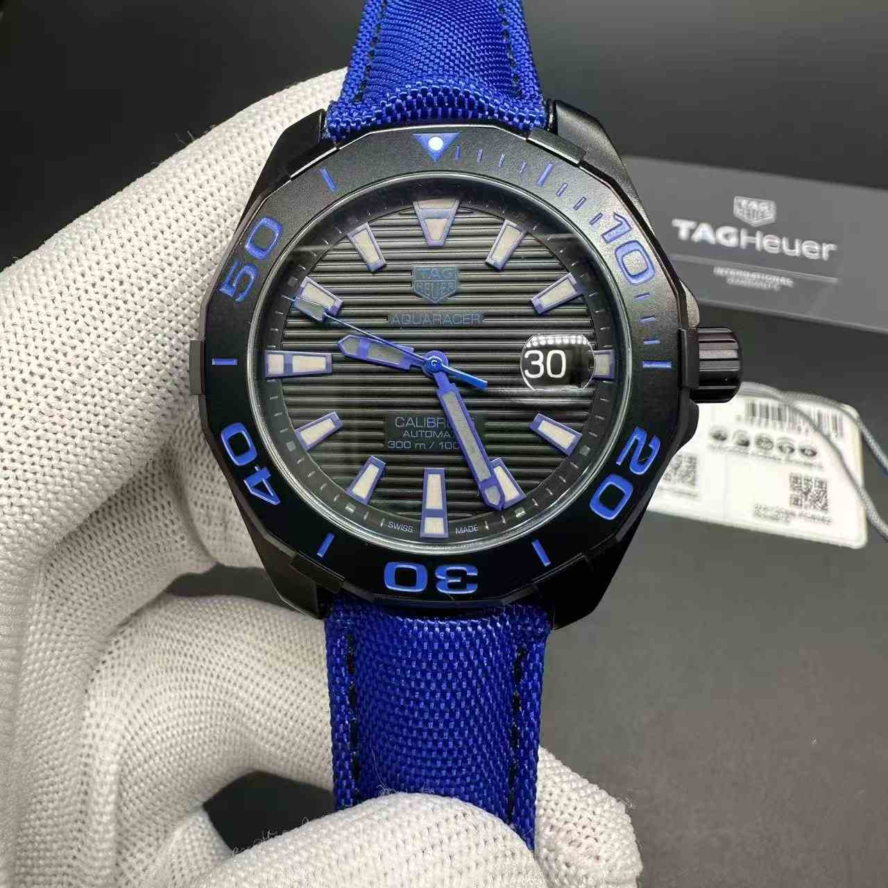 TAG Aquaracer Swiss automatic black case 44mm blue strap. 350$
