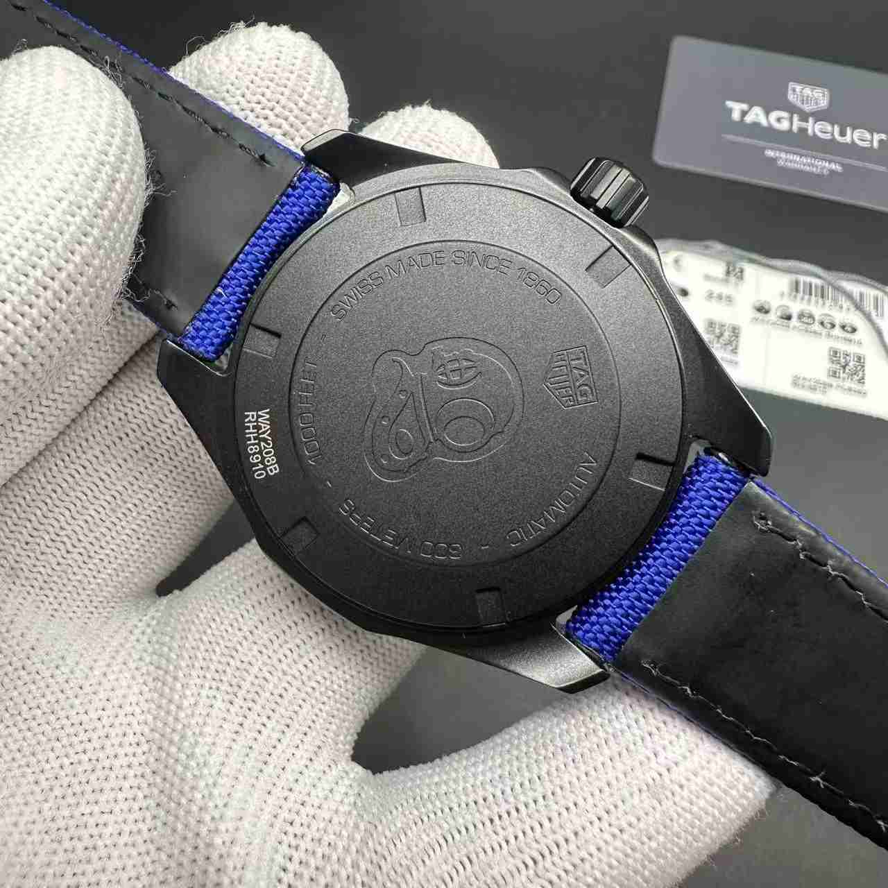 TAG Aquaracer Swiss automatic black case 44mm blue strap. 350$