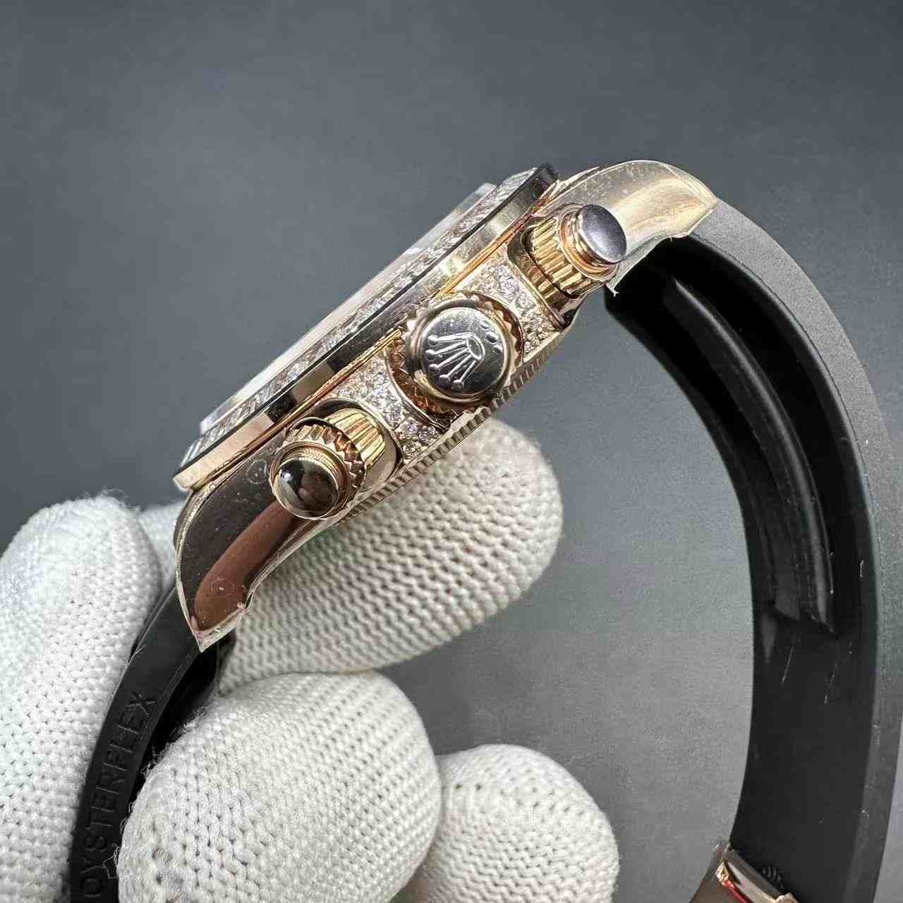 Daytona eyes of tiger super clone baguette diamonds rose gold case with black rubber. 450$