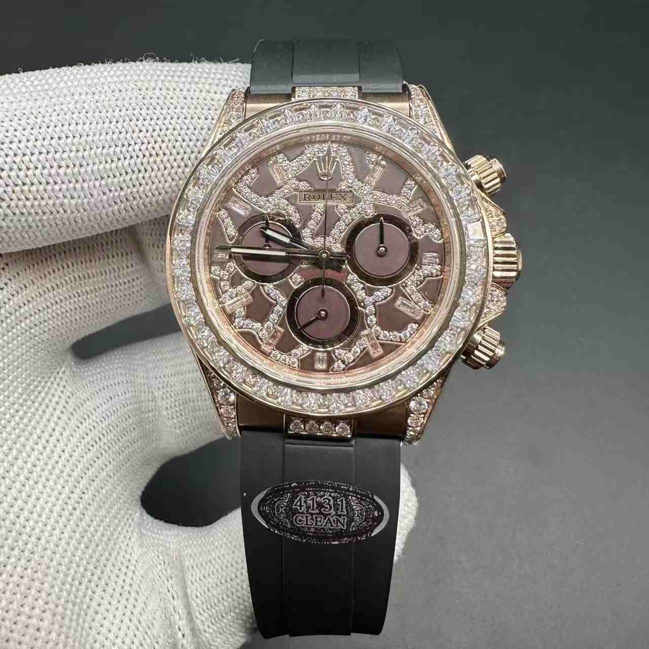 Daytona eyes of tiger super clone baguette diamonds rose gold case with black rubber. 450$