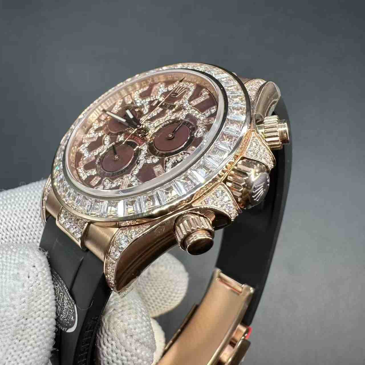 Daytona eyes of tiger super clone baguette diamonds rose gold case with black rubber. 450$