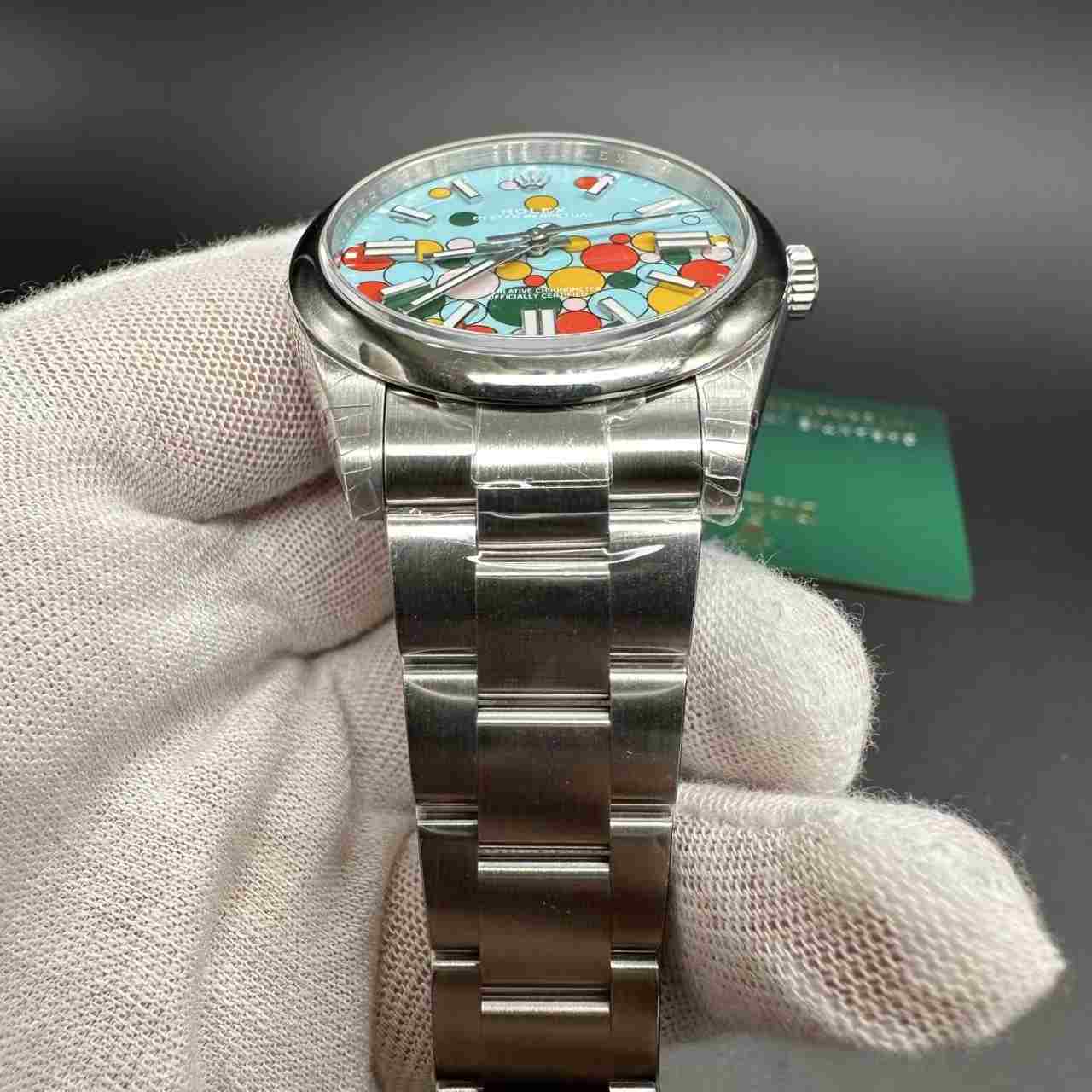 Oyster perpetual 124300 VS 3230 automatic Stainless Steel case 41mm Turquoise blue dial oyster band. 450$