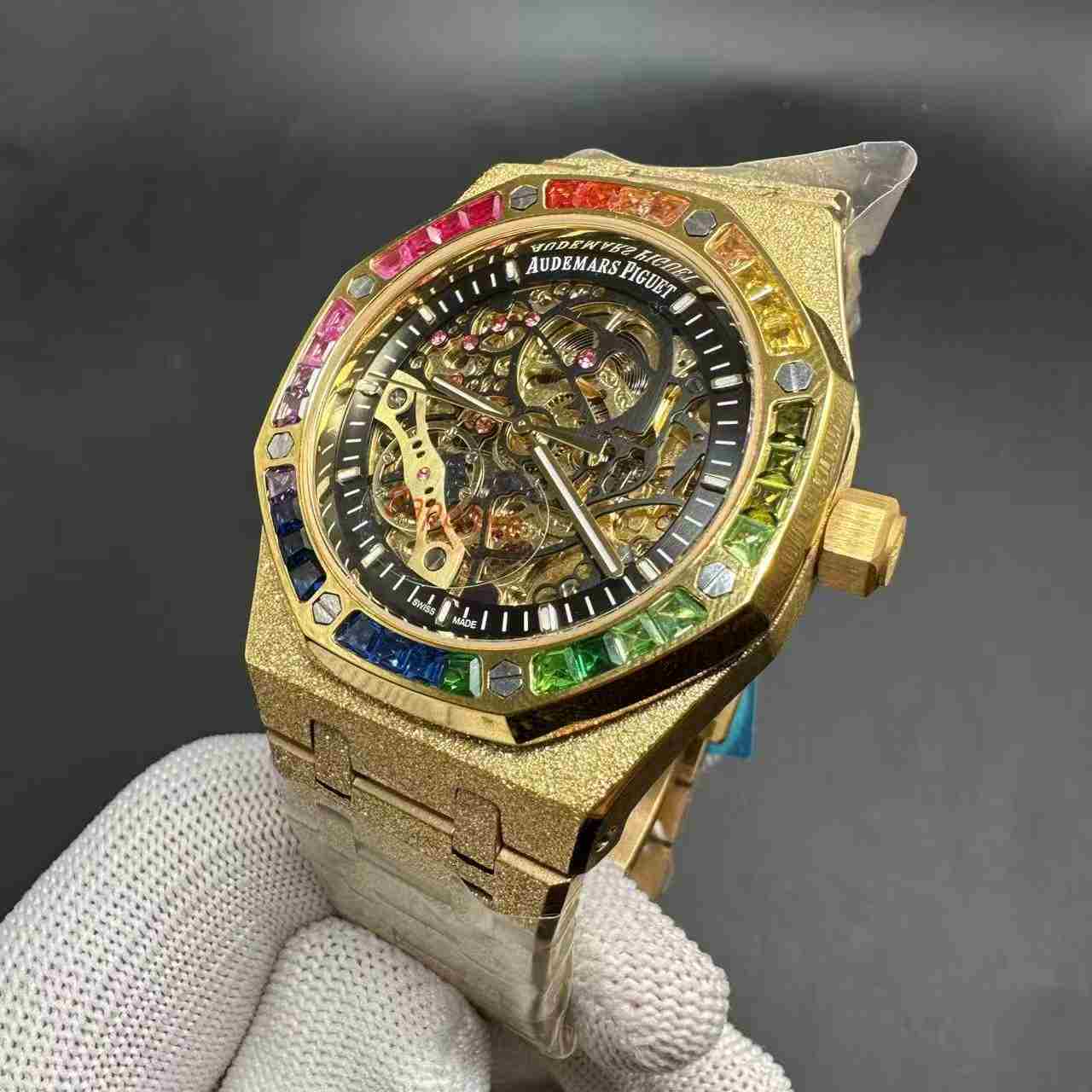 AP Royal Oak AAA+ automatic Frosted yellow gold case 42mm Skeleton dial Baguette diamonds rainbow bezel.  150$
