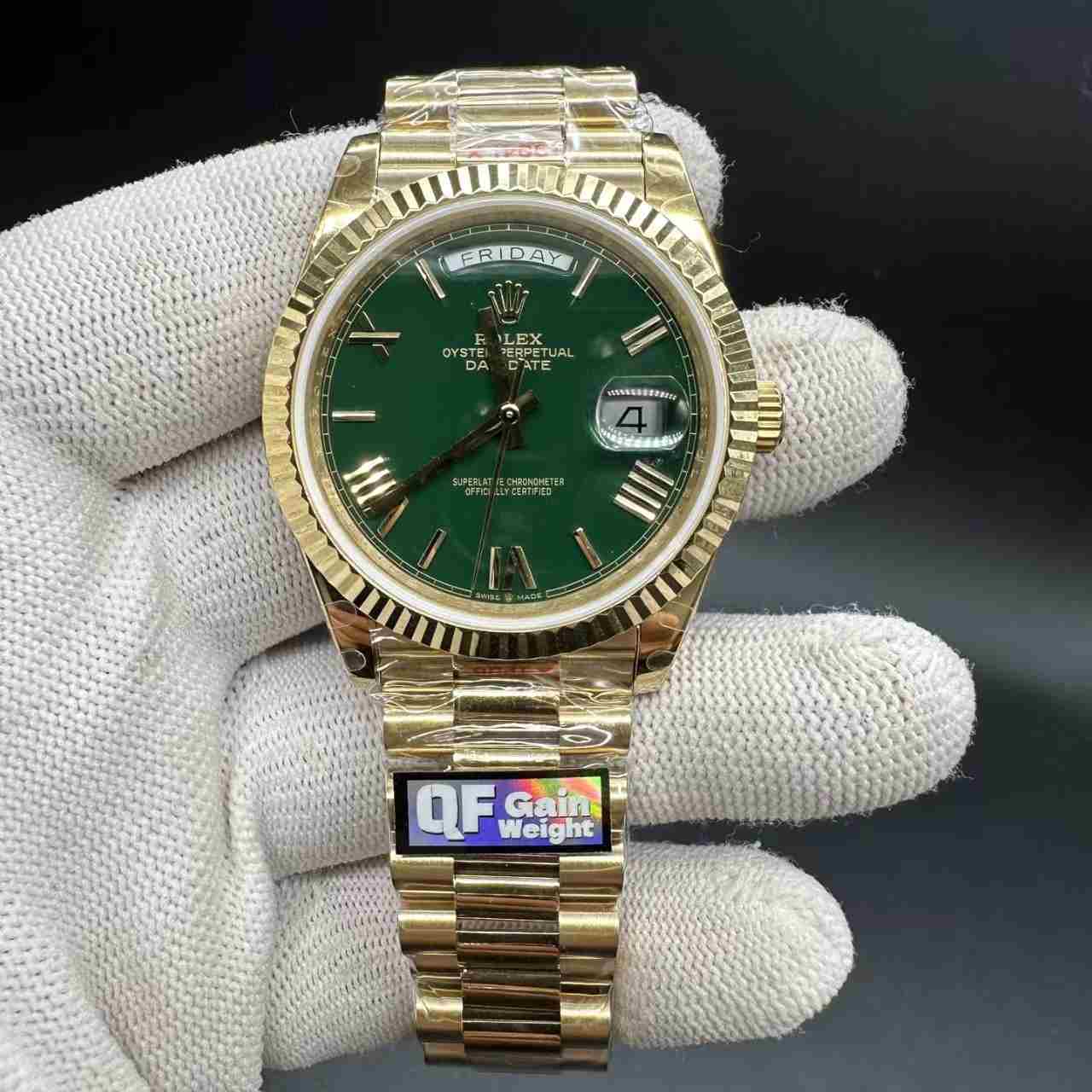 Daydate QF gain weight 180g gold case green Roman dial president band.  550$