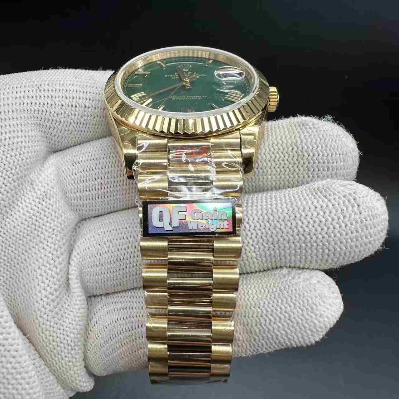 Daydate QF gain weight 180g gold case green Roman dial president band.  550$